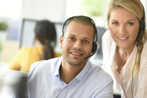 teleoperator in office with manager